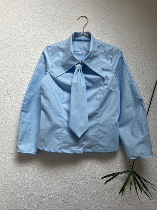 SOFIA BLOUSE: Plain cotton poplin.